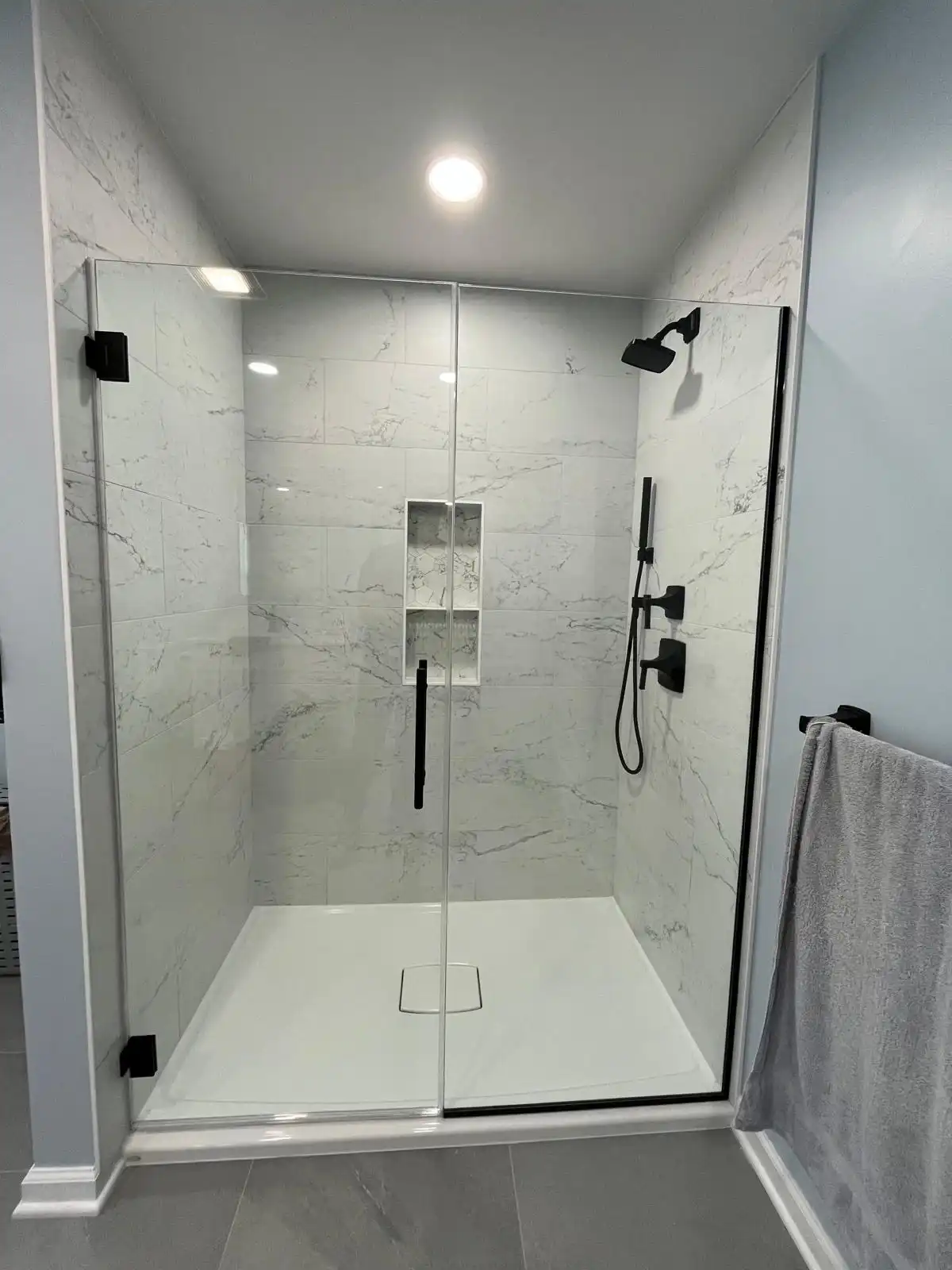 Fully enclosed frameless glass steam shower